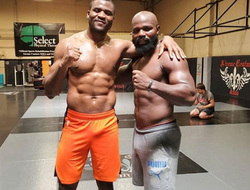 фото - Рябинский в наморднике, Бриггс — спутник Кличко, Энганну в зале с Такамом — соцсети 