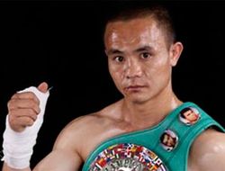 фото - Сюн Чжао Чжун отстоял титул WBC, побив Денвера Куэйо