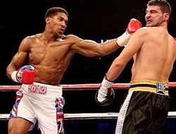 фото - Олимпийский чемпион-супертяж Энтони Джошуа удачно дебютировал в профи