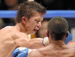 фото - Рёичи Тагучи сохранил титул после беготни за Канисалесом и спорной ничьи