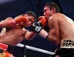 Кёгучи замесил Бермудеса в кровавой драке и остался с титулом: видео