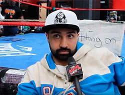 фото - Может ли Усик стать таким же большим, как Холифилд? Отвечает Малиньяджи