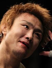 Таканори Гоми