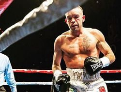 фото - Ти-Джей Дохейни сохранил титул, досрочно победив японца Такахаши