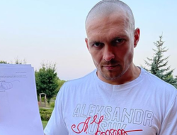 фото - Кадры дня: Александр Усик подписывает контракт на бой с Энтони Джошуа