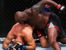 фото - Деррик Льюис — Алексей Олейник: видео лучших моментов боя