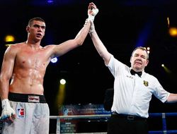 фото - Евгений Тищенко дебютировал в профи досрочной победой над Окандо