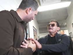 фото - Хирн и отец Гарсии послали друг друга на три буквы, а затем принялись ручкаться: странное видео