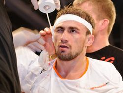 фото - Али Багаутинов против Джона Линекера на UFC 169